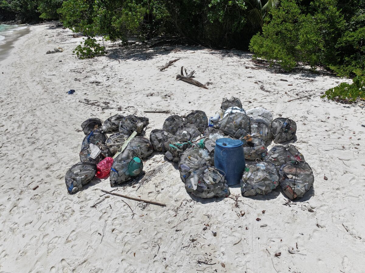 From above: the pile of full bags of rubbish collected on the beach.